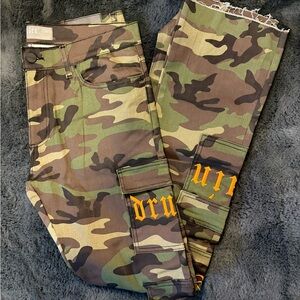 GOLDEN DENIM The Stacked Villa “Drugs Heal Pain” Camo Pants Size 34